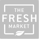 Logo of The Fresh Market in a square design. The word FRESH is bold and centered, with THE above and MARKET below. A leaf icon is situated at the bottom. The background is black, and the text and border are white.