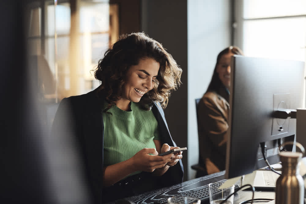 Woman on phone smiling