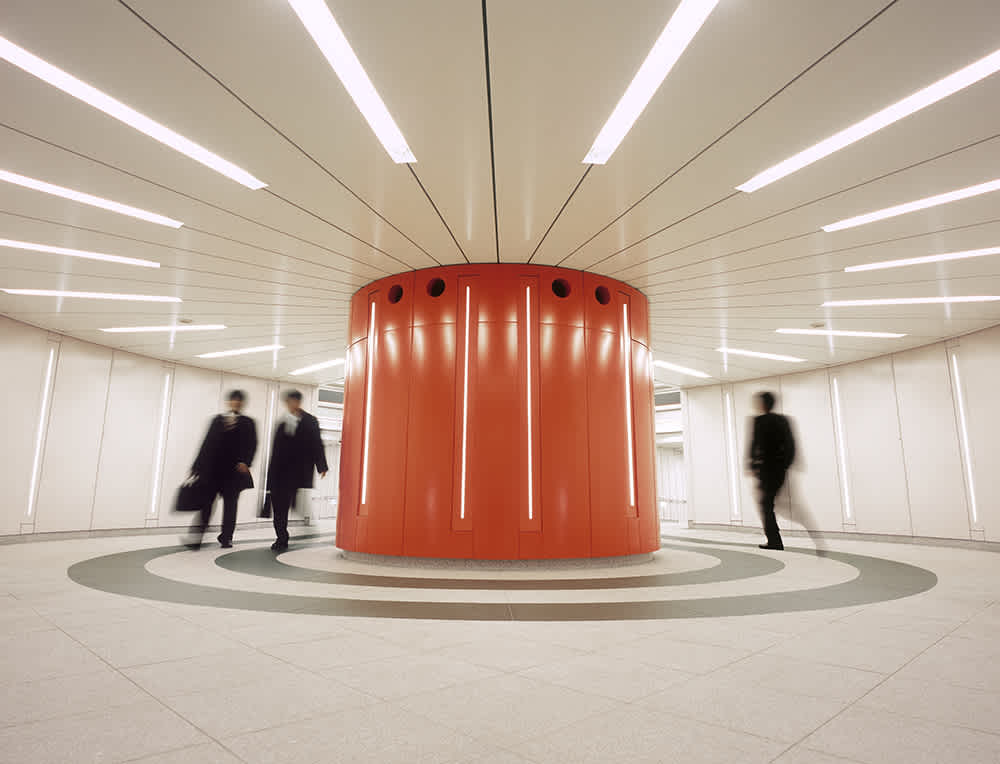 People walking in office building