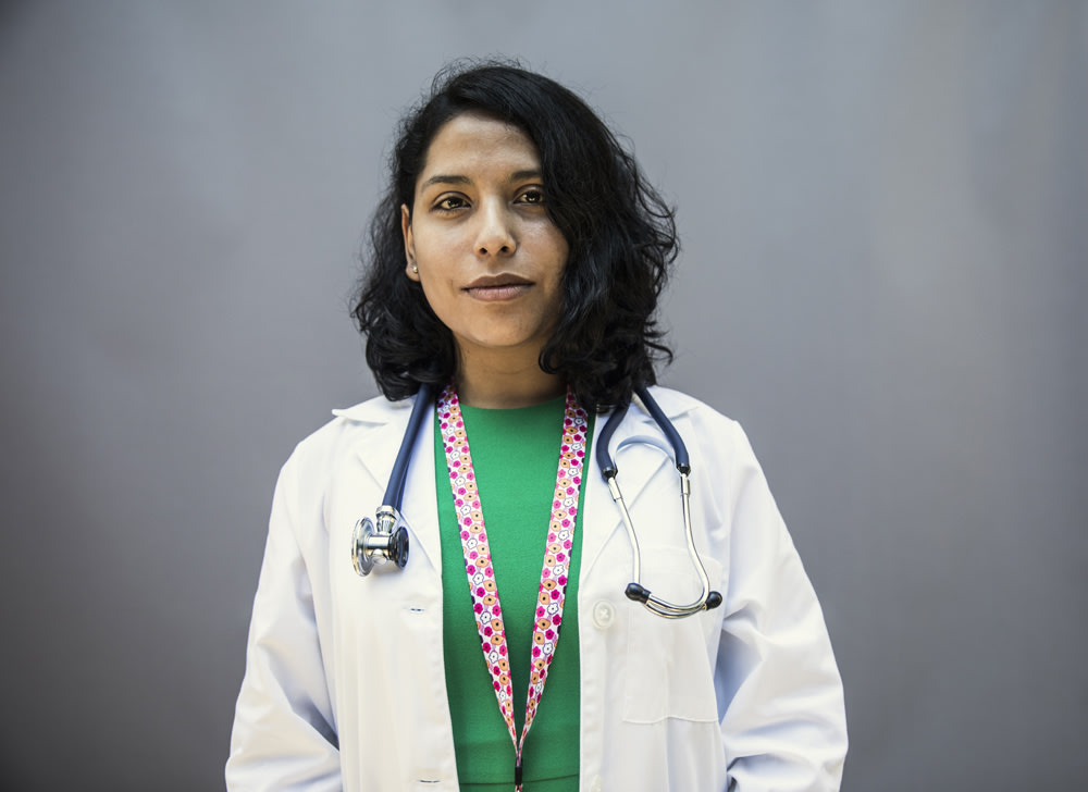 close-up shot of female doctor with dark black hair 