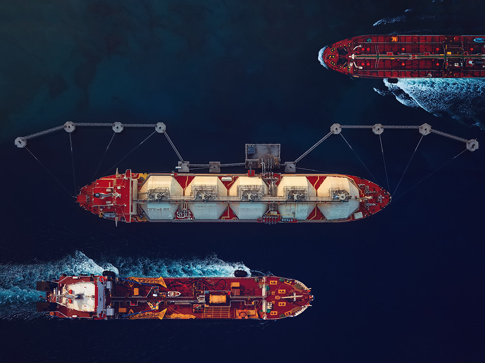 aerial view of cargo ships at night 