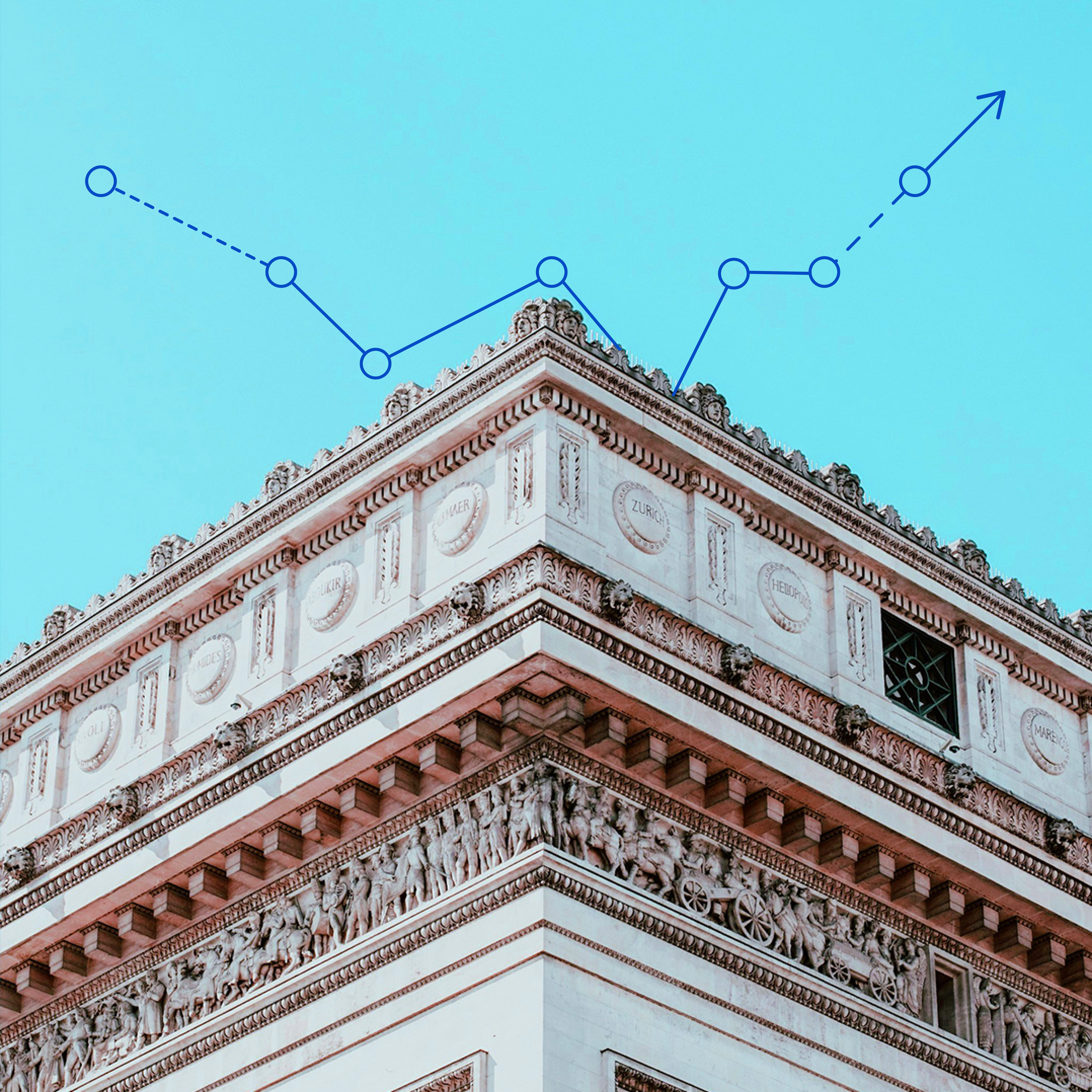 vertical view of tiered building curving inward against clear blue sky